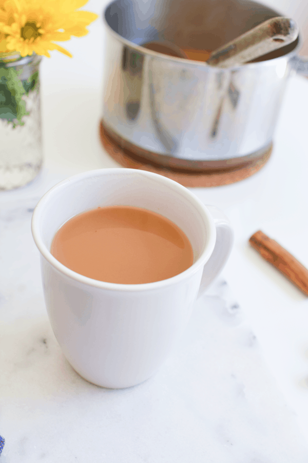 My kids wait all year for this easy homemade hot apple cider recipe with apple juice. It's full of warm fall spices and it makes a great afternoon treat on a cold afternoon.