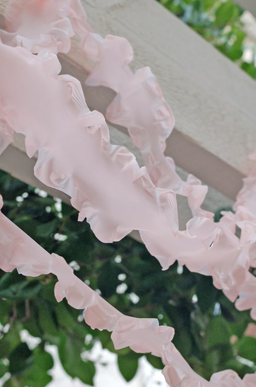 The cutest ruffled streamers from plastic tablecloths! Cupcakes and