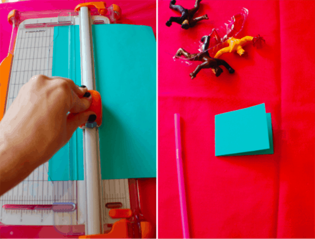 Women using a paper cutter to cut paper into small strips. 