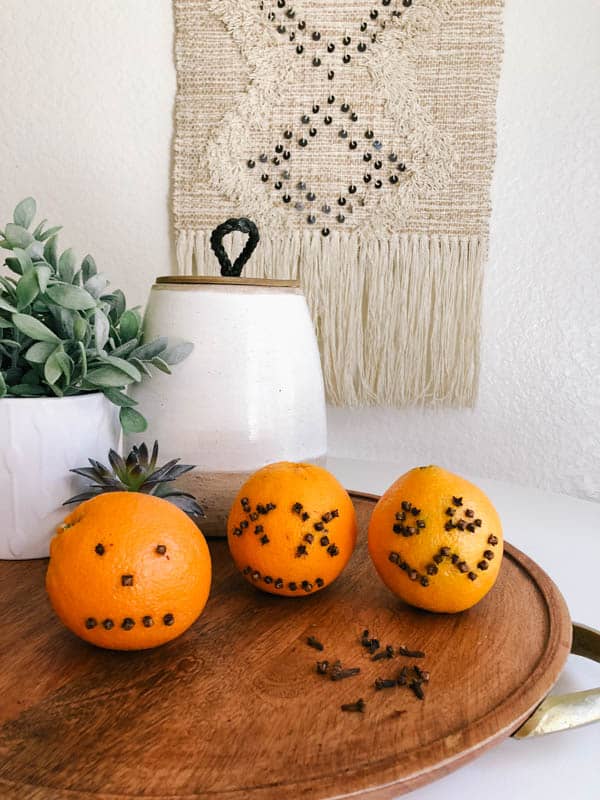 pumpkin face oranges studded with cloves