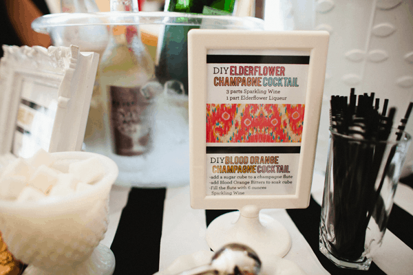 A sign with a cocktail recipe for a bridal shower. 