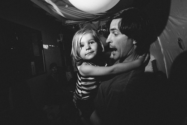 father and son enjoying a birthday party
