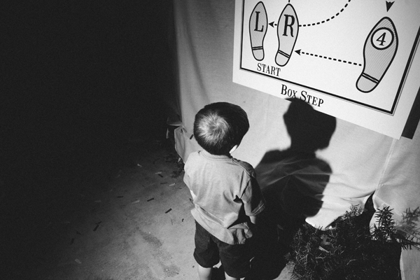 kid learning how to do dance steps at a kid's dance party
