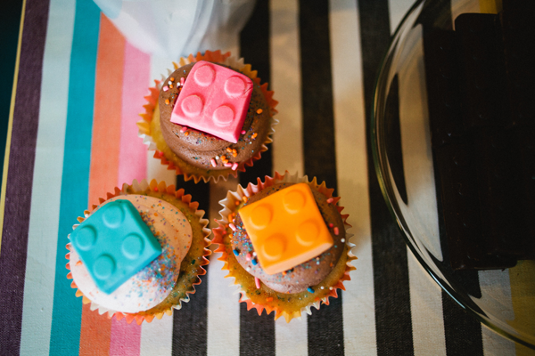 Cupcakes with Lego fondant toppers.