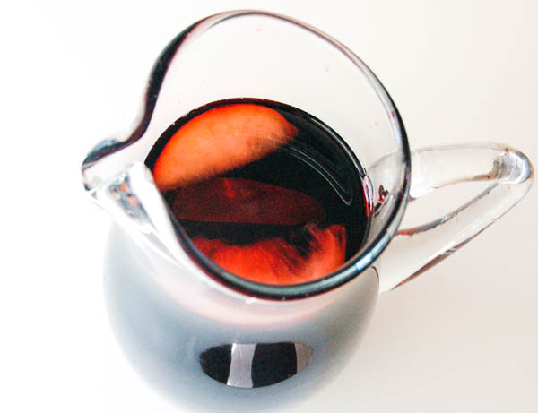 warm fall sangria with red wine in a pitcher
