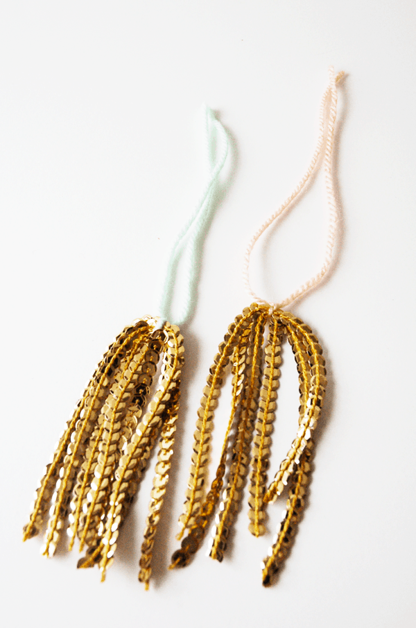 I love this simple tutorial for gold sequin tassels. The mint and peach go so well with the gold!