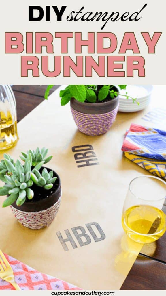 Text: DIY stamped Birthday Runner with an image of a kraft paper runner stamped with "HBD" on it on a table.