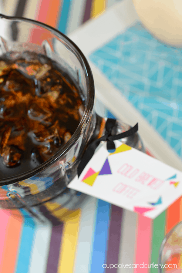 Overhead view of a pitcher with iced coffee. 