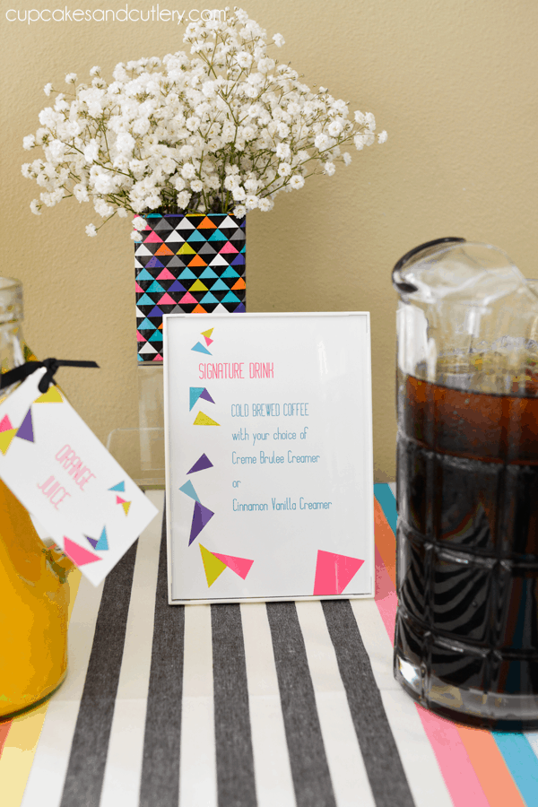 A framed drink menu for a mimosa and iced coffee station. 