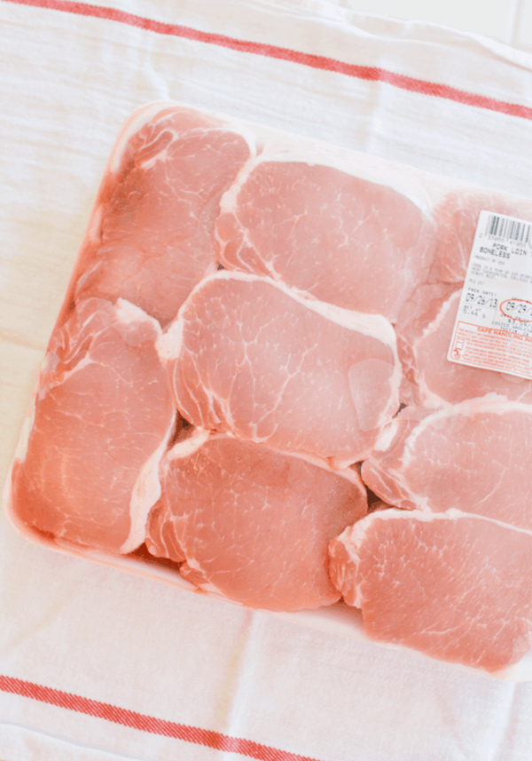 Close up of a package of pork chops. 