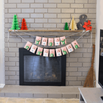 holiday photo banner hanging on a mantle