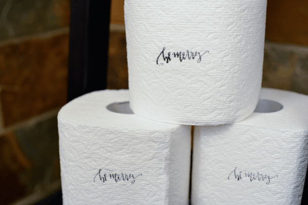 stack-toilet-paper-before-the-holiday-party