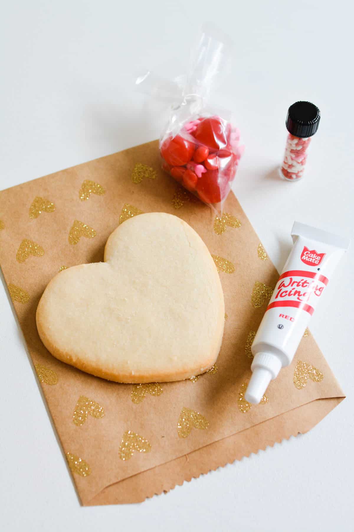 A DIY cookie decorating kit using store-bought cookies with icing and sprinkles.