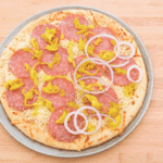 Here's a fun twist for pizza night. Salami and pepper pizza with garlic butter sauce!