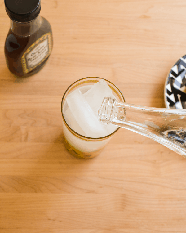 Top muddled ginger and limes with water for a refreshing summery beverage. // www.cupcakesandcutlery.com