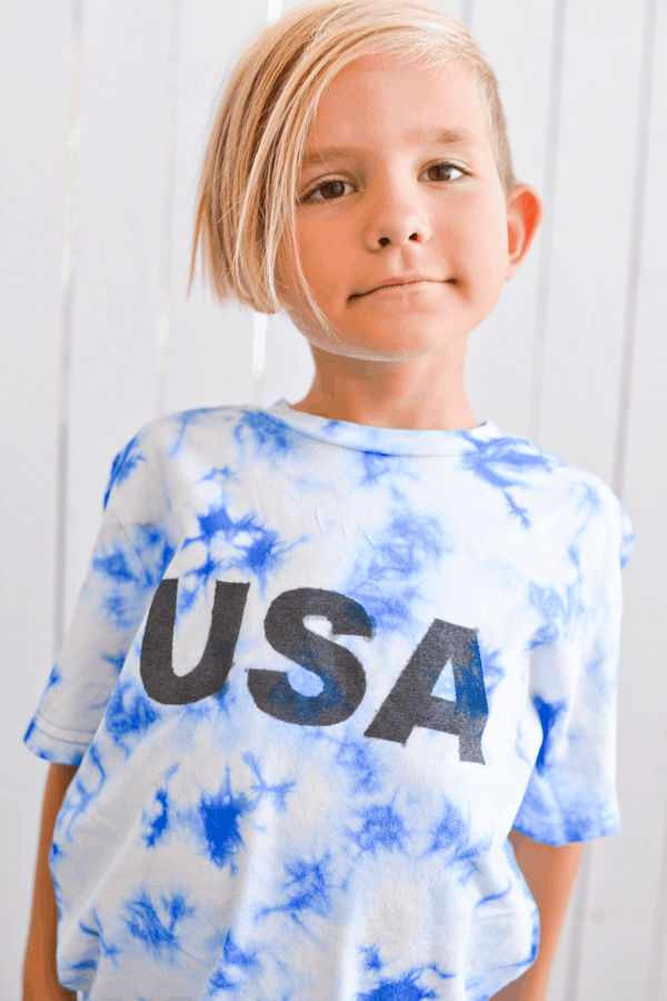 kid wearing a diy fourth of july tshirt.