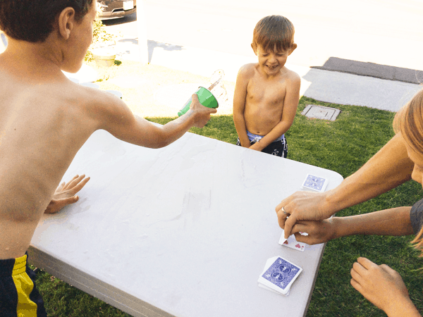 Water war is a super fun game to play at a kid's summer birthday party //  www.cupcakesandcutlery.com