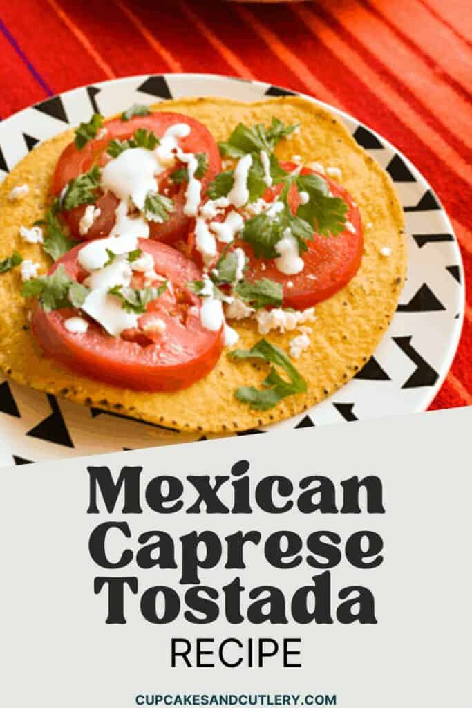 Text- Mexican Caprese Tostado recipe with a tostada topped with tomatoes and cilantro on a plate.