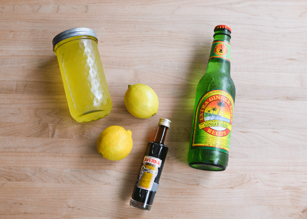 Ingredients to make an Amaro cocktail with citrus infused vodka.