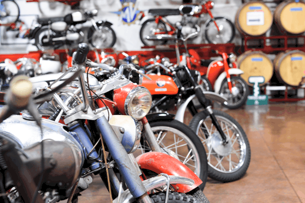 Classic motorcycles in the barrel room at Doffo Winery. #temecula