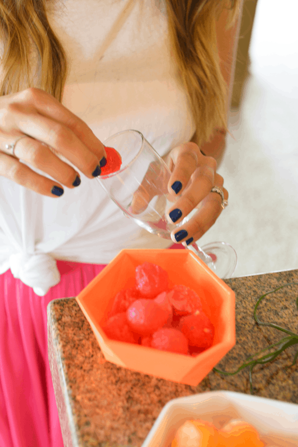 Use frozen melon balls in sparkling champagne for a touch of color and flavor. #campmixalot. // cupcakesandcutlery.com