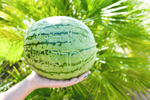 Talking watermelons. Carve them to create awesome party decor and signage.