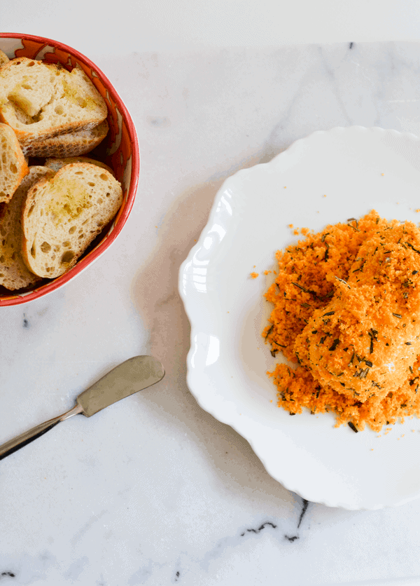 Rosemary goat cheese log with cheetos.