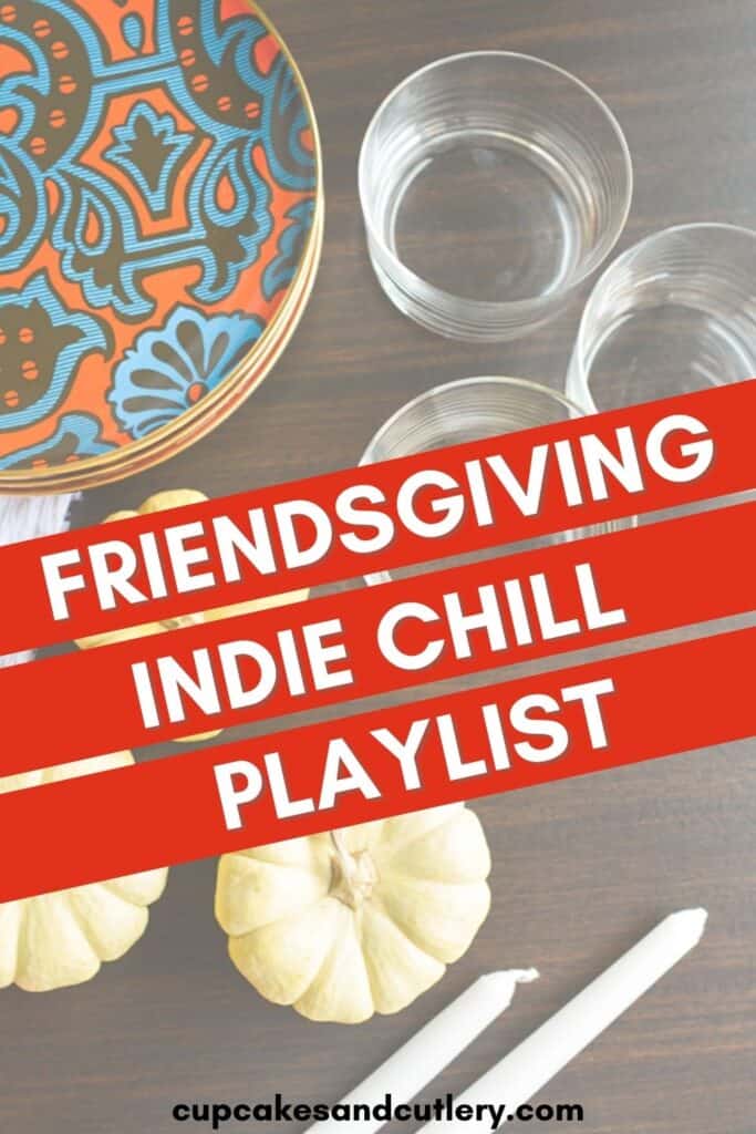 Top down view of a Thanksgiving table, with text that reads Friendsgiving Indie Chill Playlist.