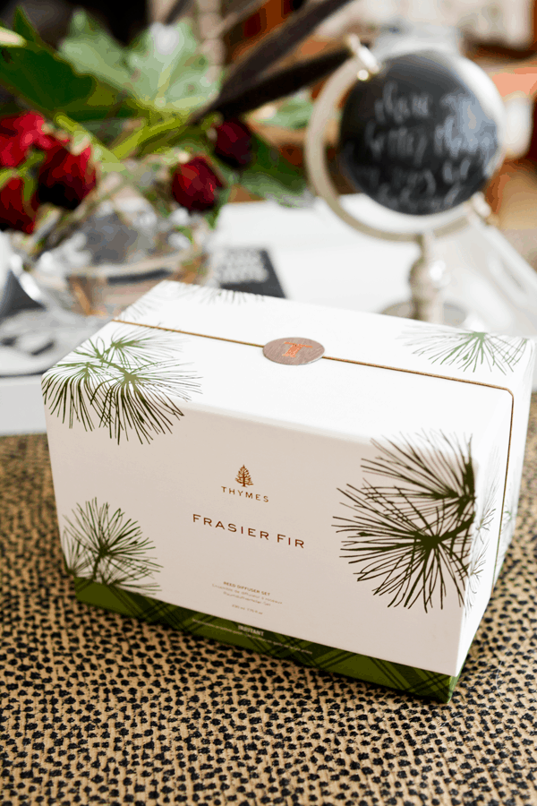 Choose a signature scent for your house during the holidays like this Frasier Fir Candle set