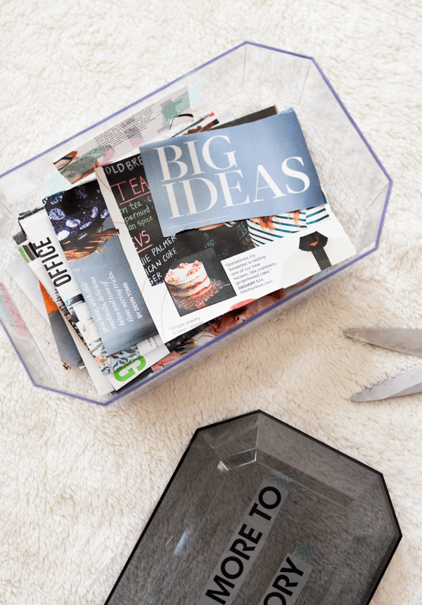A box full of cut out sayings and photos from magazine pages to use as a vision box.