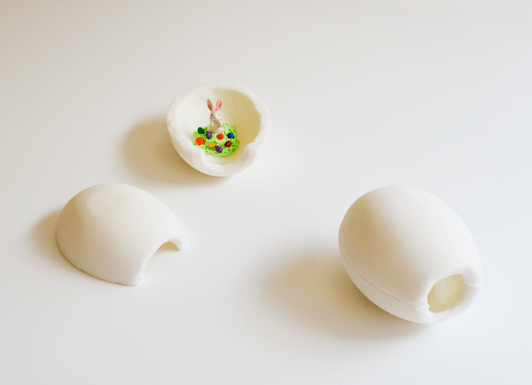 White sugar Easter Eggs on a table.