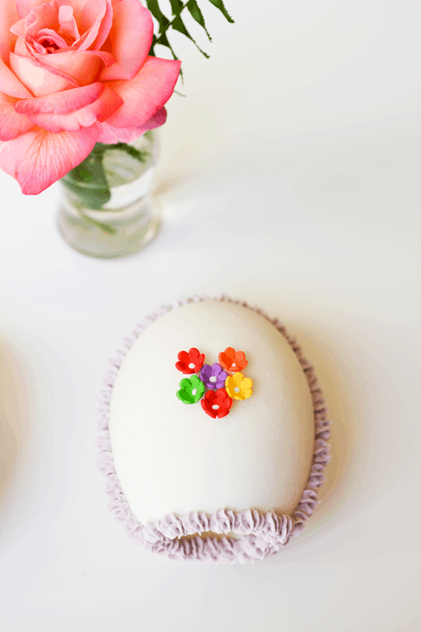 Overhead view of a Sugar Easter Egg decorated with sugar flowers.