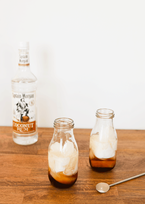 Kahlua and rum in bottles for an easy White Russian Recipe