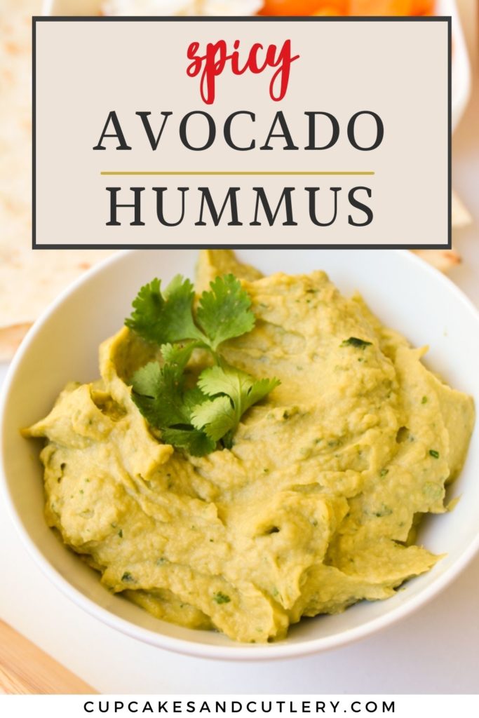 A bowl with spicy avocado hummus in it with text over it.