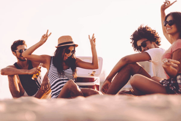 people enjoying a beach party