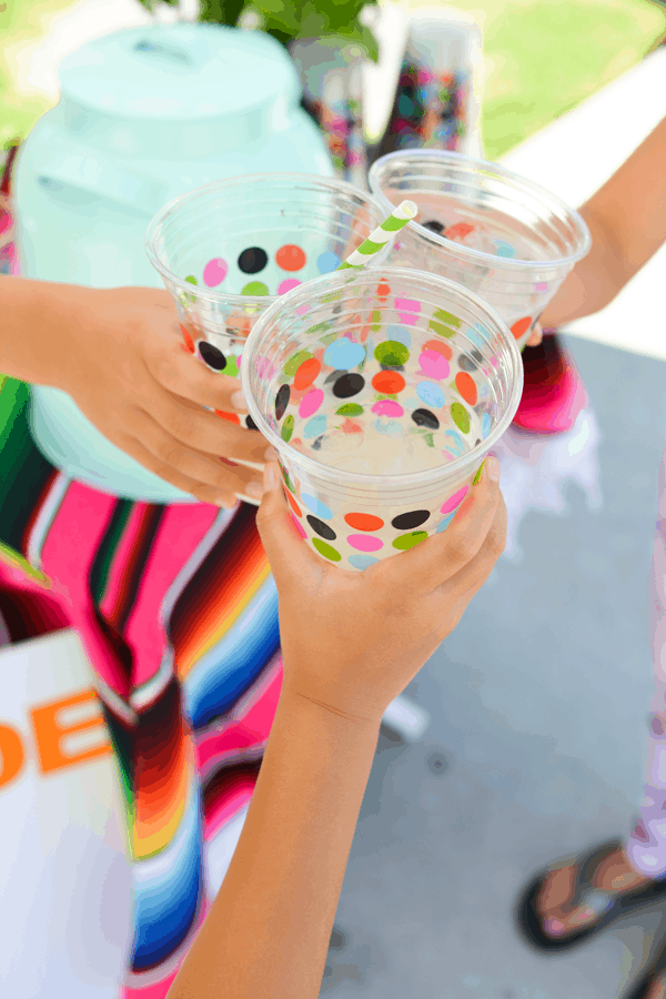 Easy large batch lemonade recipe and free printable decorations for your next summer lemonade stand. #ad #cheekylemonade