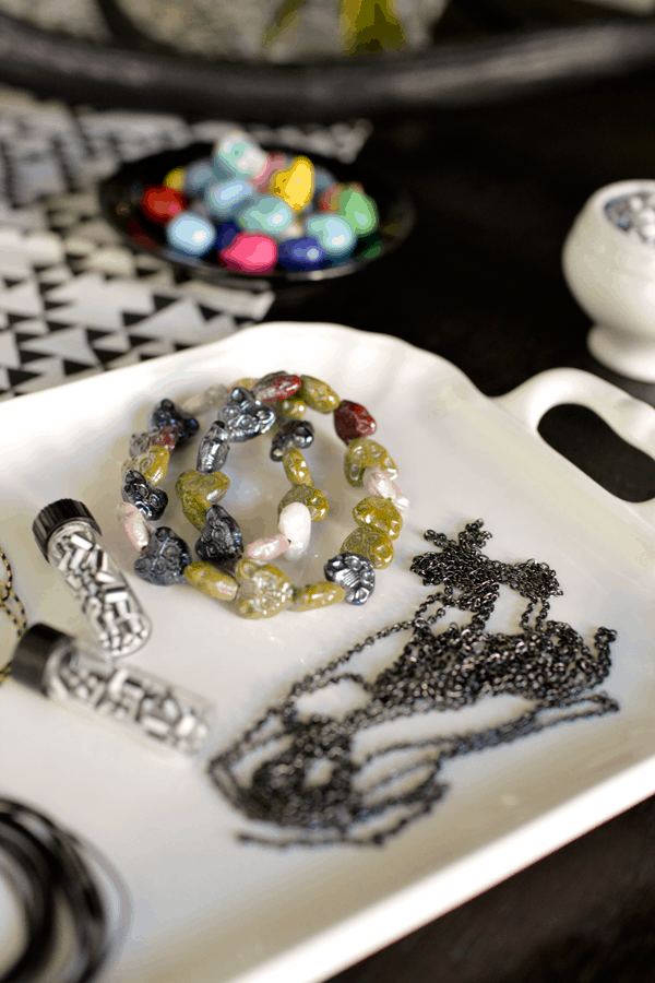 Jewelry supplies for a fun black and white adult Halloween party.