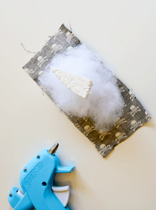 Fabric, stuffing, styrofoam and a hot glue gun - all supplies to make the body of a fabric bug