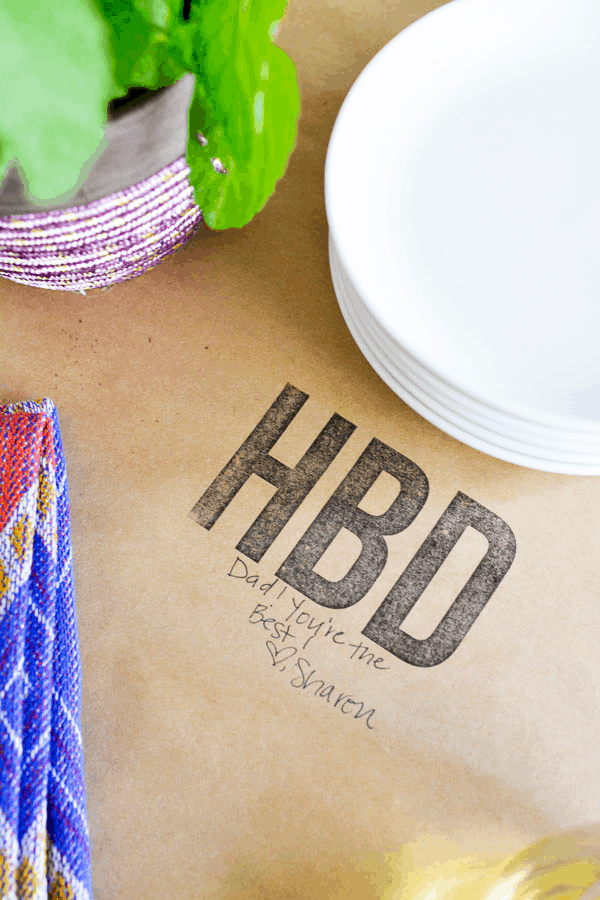 Here's a fun DIY for creating a personalized message table runner! Simply stamp on a sentiment (like HBD for Happy Birthday) and then let your party guests leave special messages for the guest of honor. 