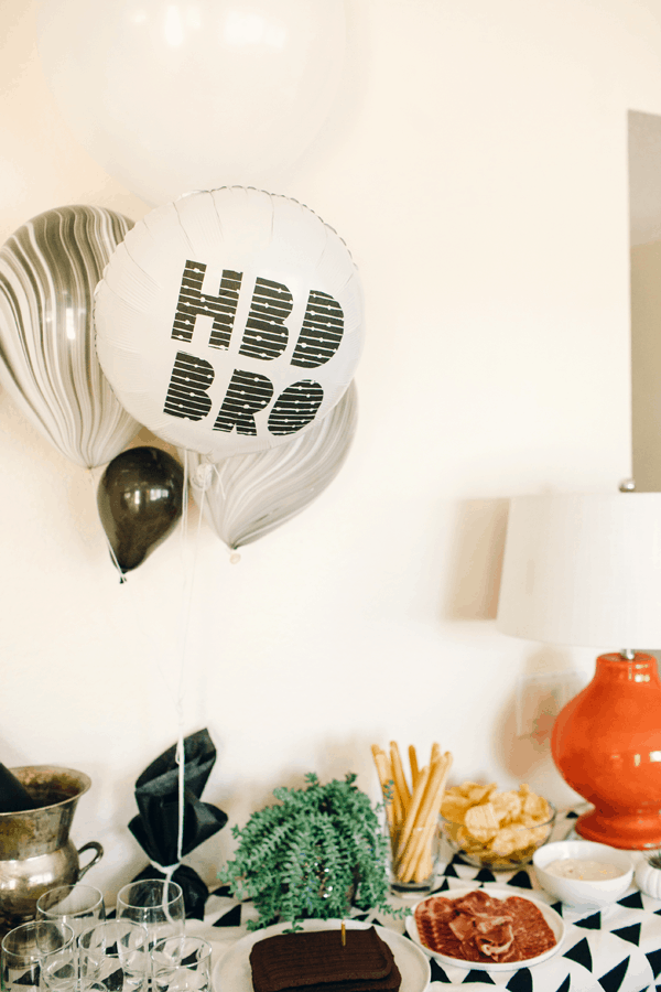 A DIY balloon sign for a party that is used for decoration. 