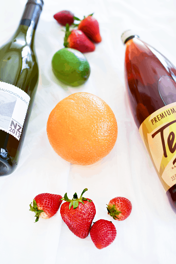 White wine and tea make the perfect sangria recipe. The fresh strawberries and citrus give it amazing flavor.