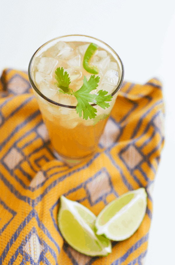 Mexican Mule on a scarf next to fresh lime wedges.