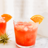 Use sangria flavored vodka for this vodka sunrise cocktail recipe! The recipe is so easy and totally delicious!