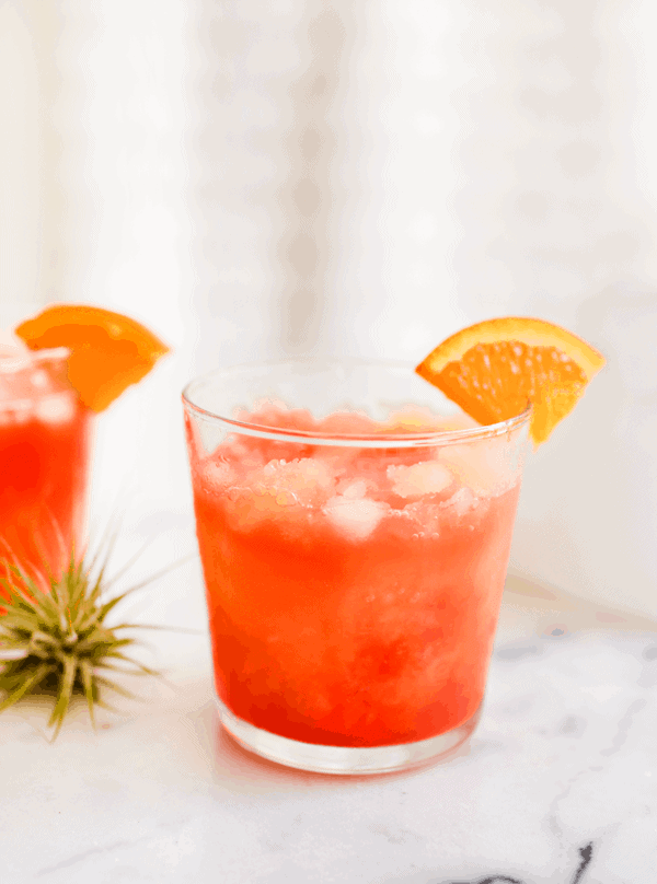 Use sangria flavored vodka for this vodka sunrise cocktail recipe! The recipe is so easy and totally delicious!