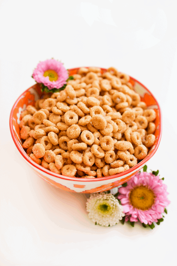 Stop right now and make these Buttered Cheerios™! This easy snack recipe has truffle oil and parmesan cheese. It's the perfect snack for busy moms!