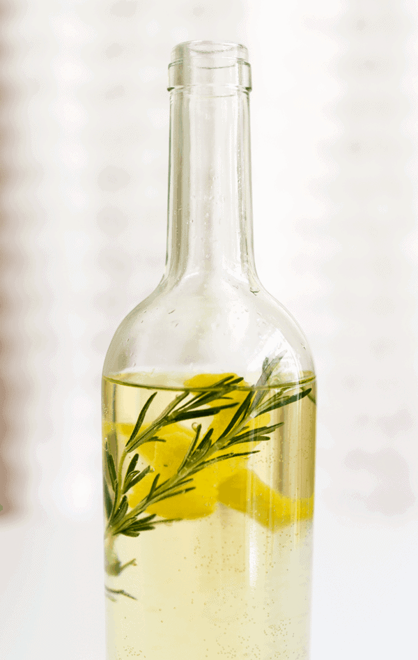 How to make herb infused wine. It doesn't even require a recipe, just pick your favorite herbs and fruit and create your own delicious drinks! | Cupcakes and Cutlery
