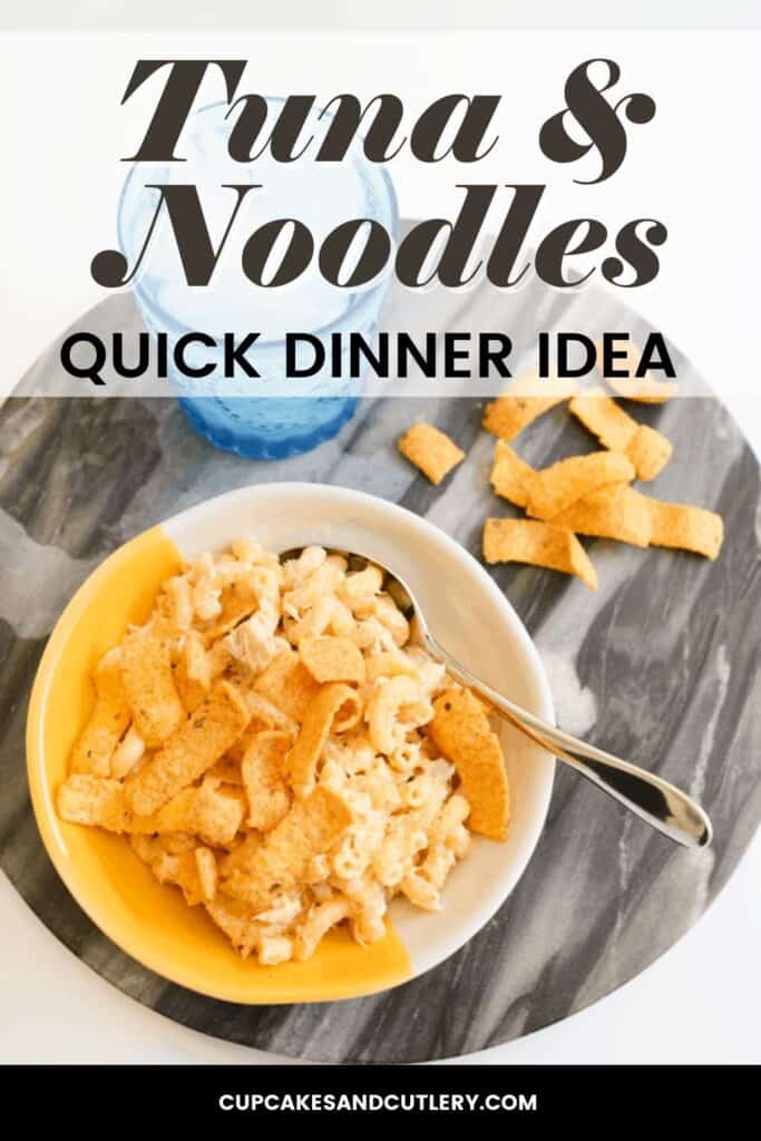 A bowl full of tuna and noodles and topped with chips.