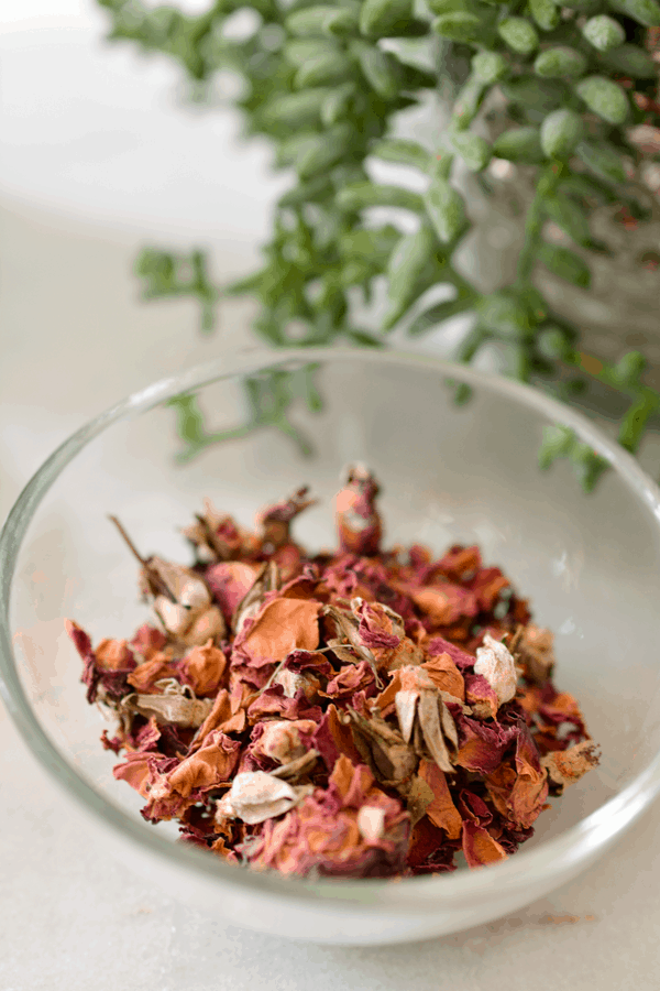 A small bowl of dried rose petals. 