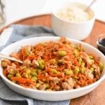 Small white bowl of a teriyaki ground turkey stir fry recipe for a family dinner.