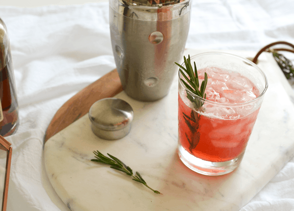 Looking for fun holiday inspired cocktails? Try this Cranberry Whiskey Sour recipe. It's the perfect drink for Thanksgiving and Christmas! 